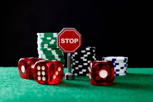 Caishen Wins slot game display showing five reels with wealth-themed symbols and payout table